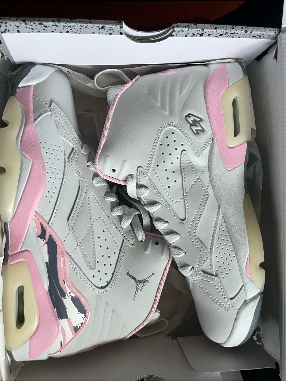 Jordan Women's High-Top Sneakers in White and Pink Accents